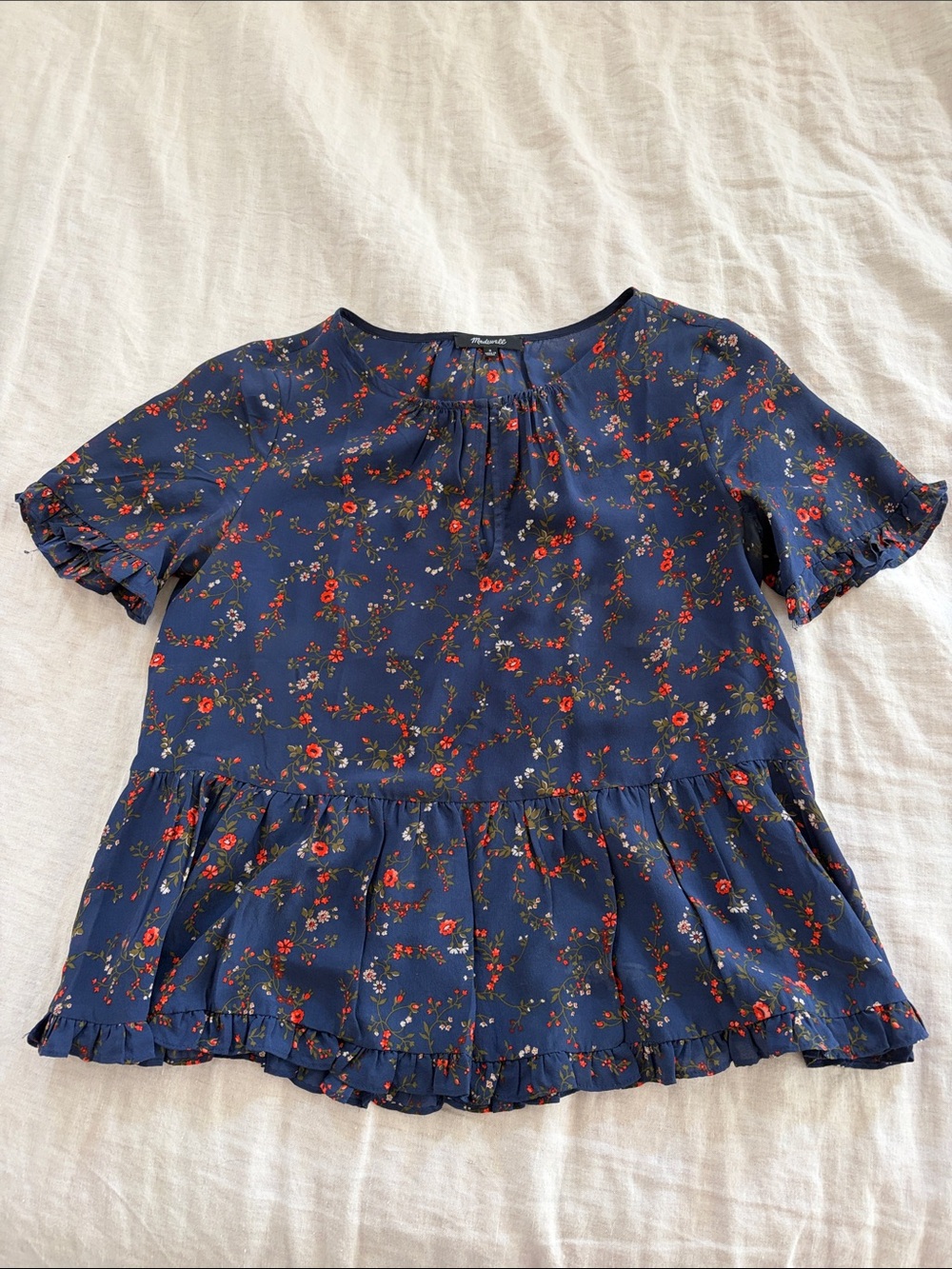 Navy Floral Ruffle Peplum Top